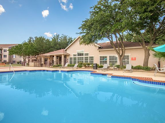 Resort-Style Pool with Lounge Seating at Avonmora Apartments in Austin, TX
