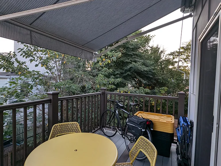 Covered patio with a retractable awning