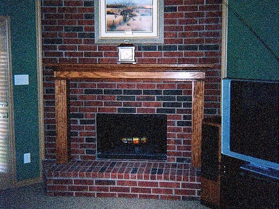 Gas-assisted fireplace