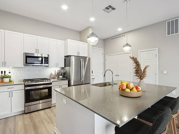 3rd image of 8688 E Raintree Dr #66-0-5