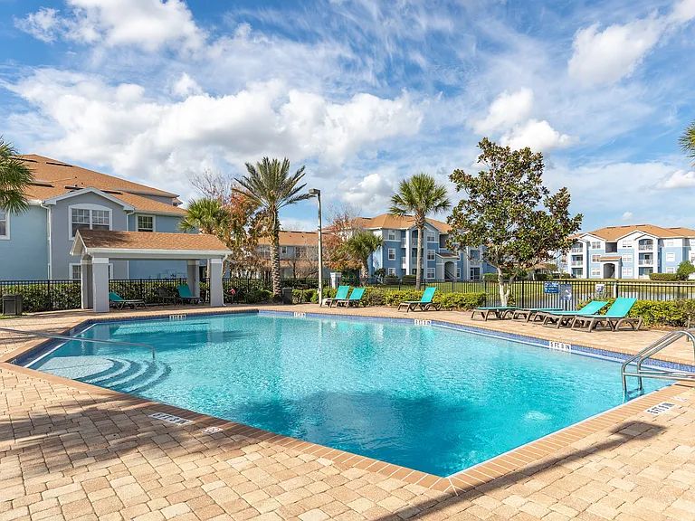 Sparkling pool with plenty of space to relax.