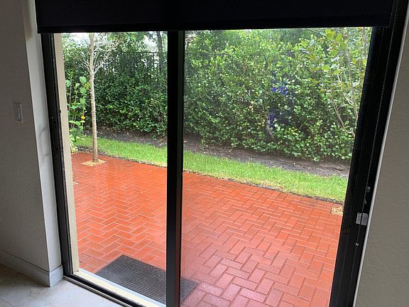 Backyard facing Hillsboro Blvd