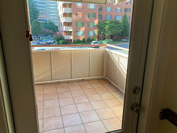 Tile balcony. Plants, chairs, fresh air.