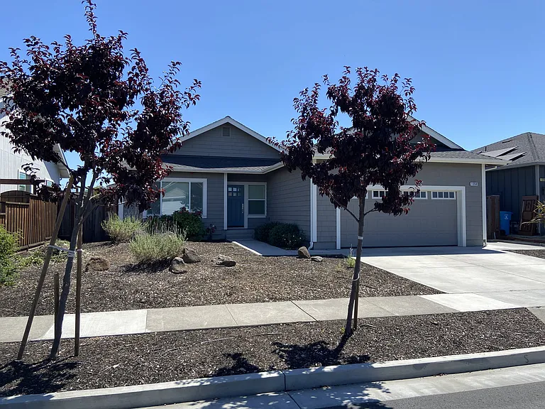 Front yard drip irrigation and 2-car garage