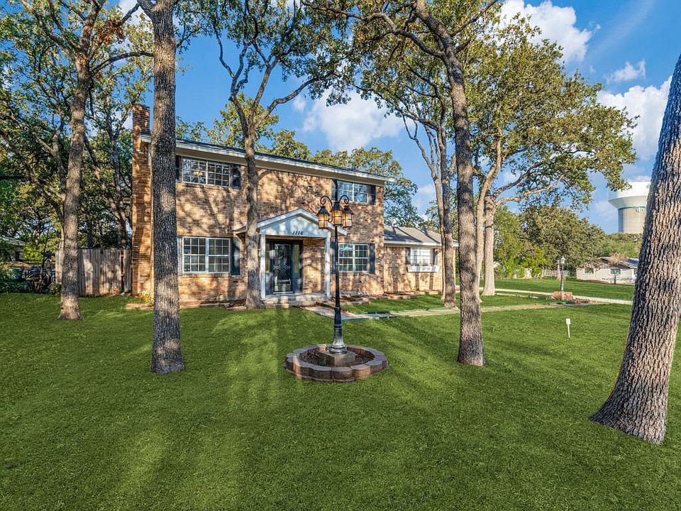 another view of front of property , grass needed