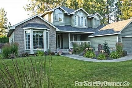 Front
						:
						New landscaping, crushed basalt, basalt boulders, alpine fir, tall grasses