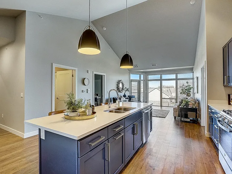 Kitchen with pull out trash/recycling