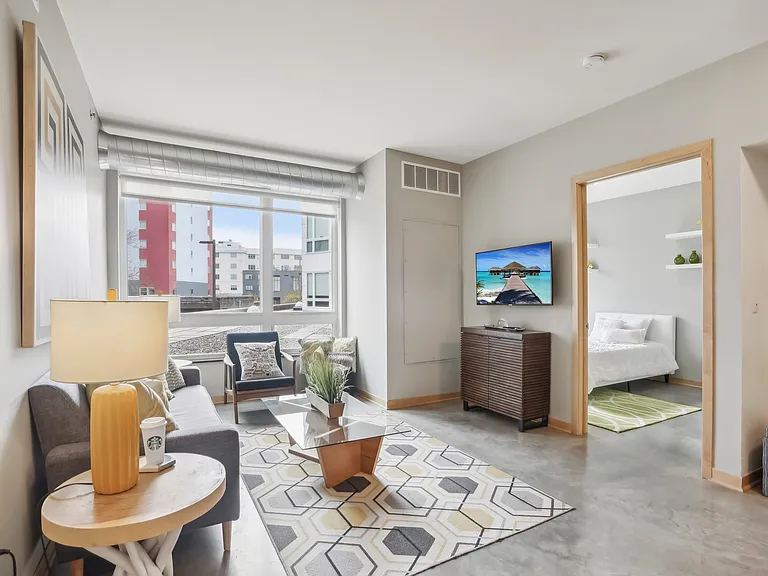 Experience urban living in this stylish and bright living room. Experience urban living in this stylish and bright living room.