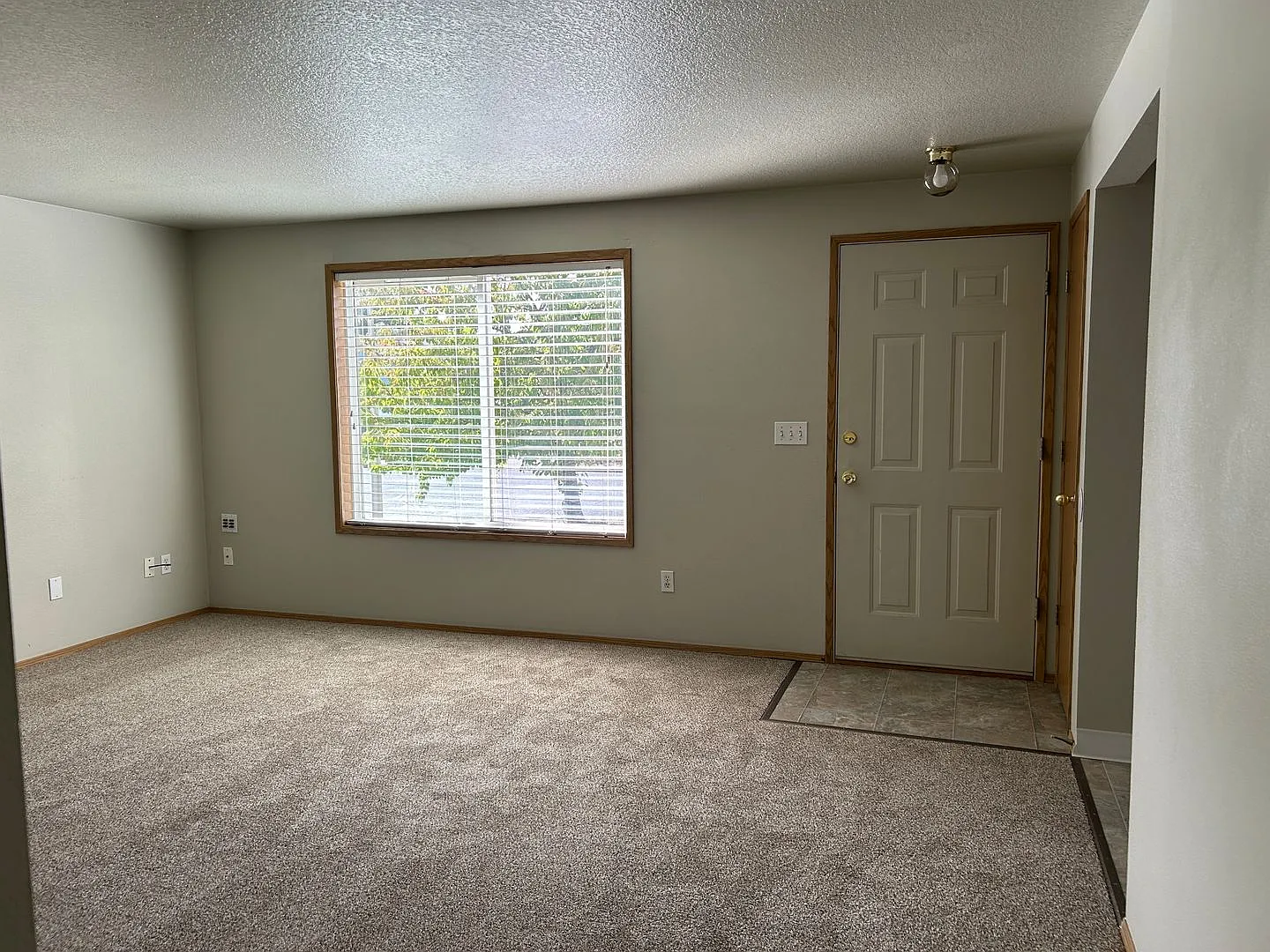 Three Bedroom Home with an Attached Garage — Photo 2