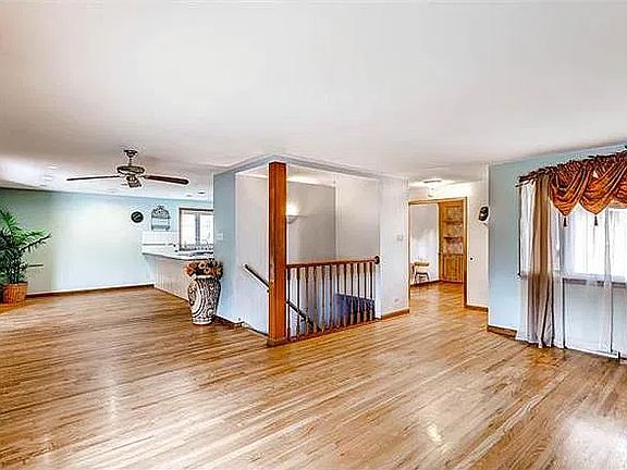 Kitchen, living room, and dining area.
