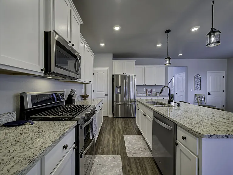 Large kitchen with stainless steel appliances and plenty of counterspace