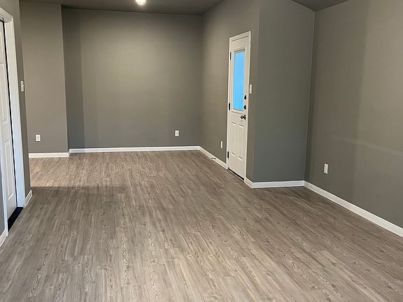 View walking in the front door. Garage door is to the left and back door is what you see on the right.