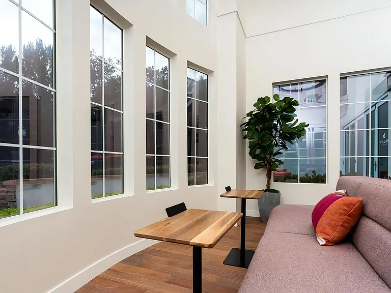 Bright Resident Lounge Overlooking Courtyard Views