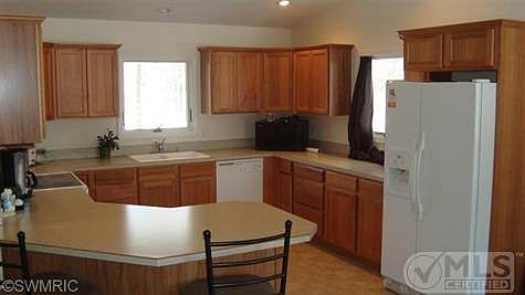 1st image of 9603 Club House Dr W #592
