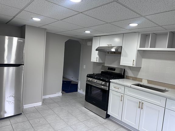 Brand new stainless steel appliances and range hood