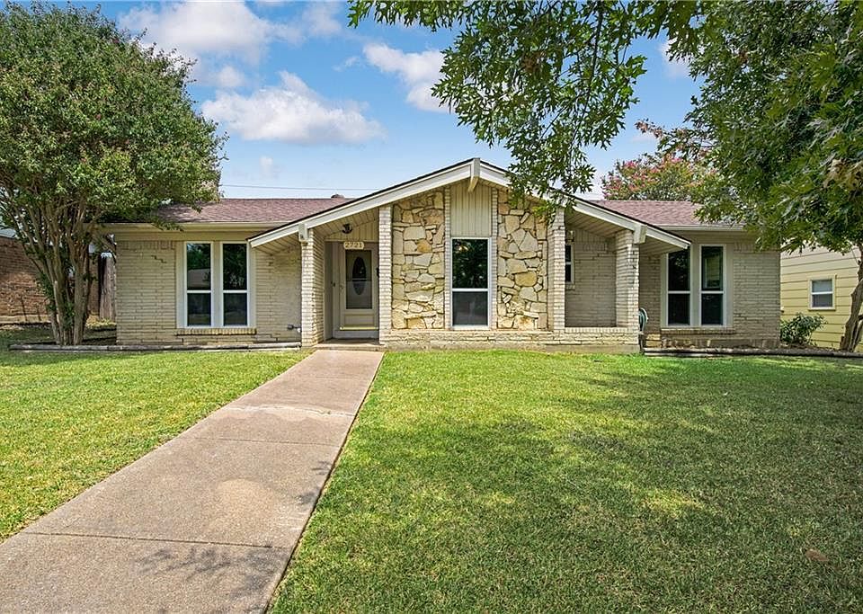 Welcome to your new home! Look at the beautiful curb appeal!