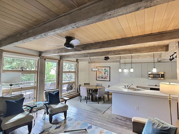 open floor plan, 6-seat dining area, gourmet kitchen, large stainless refrigerator