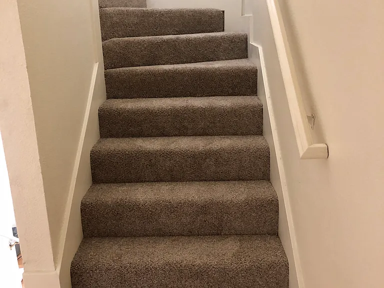 Staircase going to second floor.