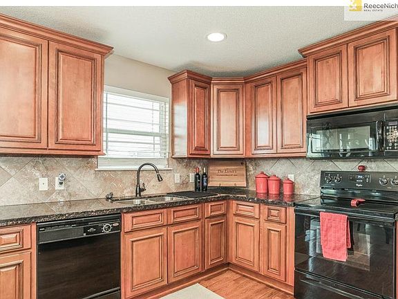 Full Height Kitchen Cabinets, Appliances (3 years old), Granite tops