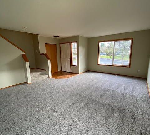 Formal living space with coat closet