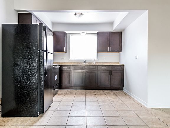 4th image of 1121-1125 W 127th St #1121-A1