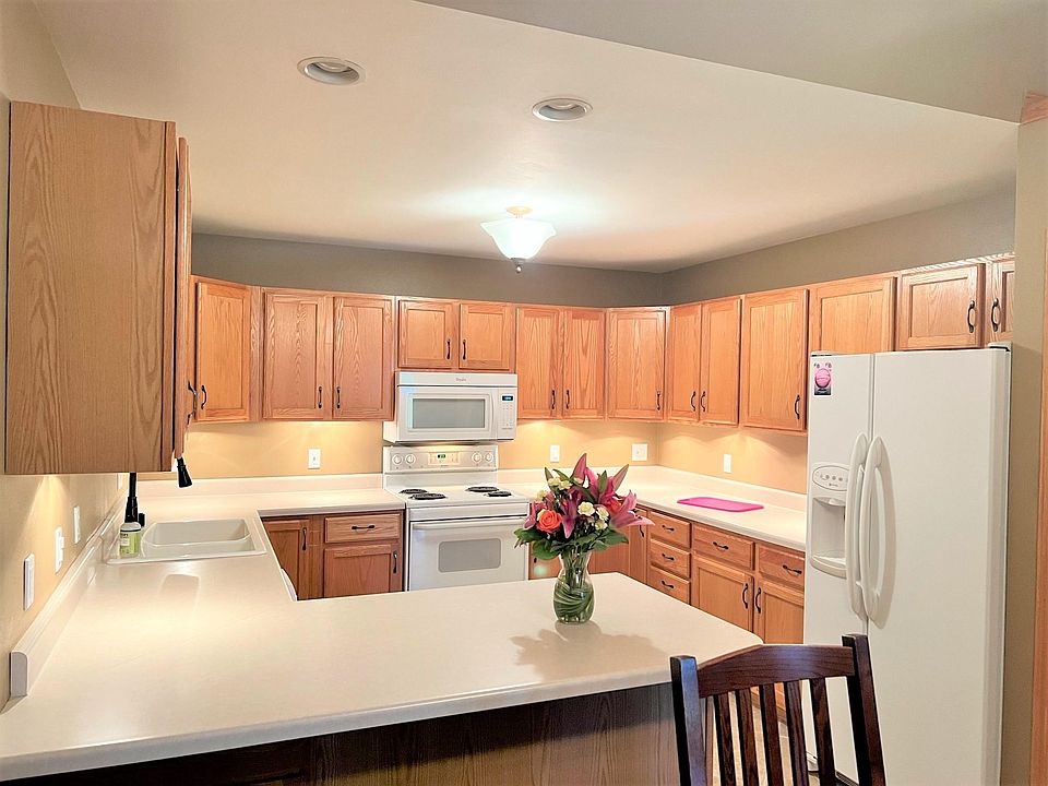 Pantry to the right of the fridge