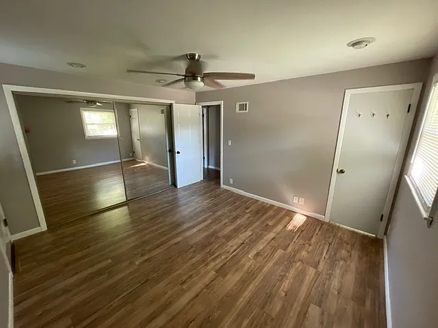 Primary bedroom - Spacious bedroom with natural light and neutral finishes