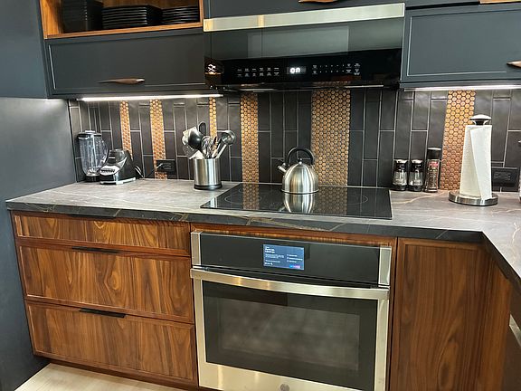 Convection oven, microwave and extra lighting underneath cupboards