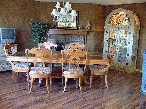 Formal dining area with fireplace