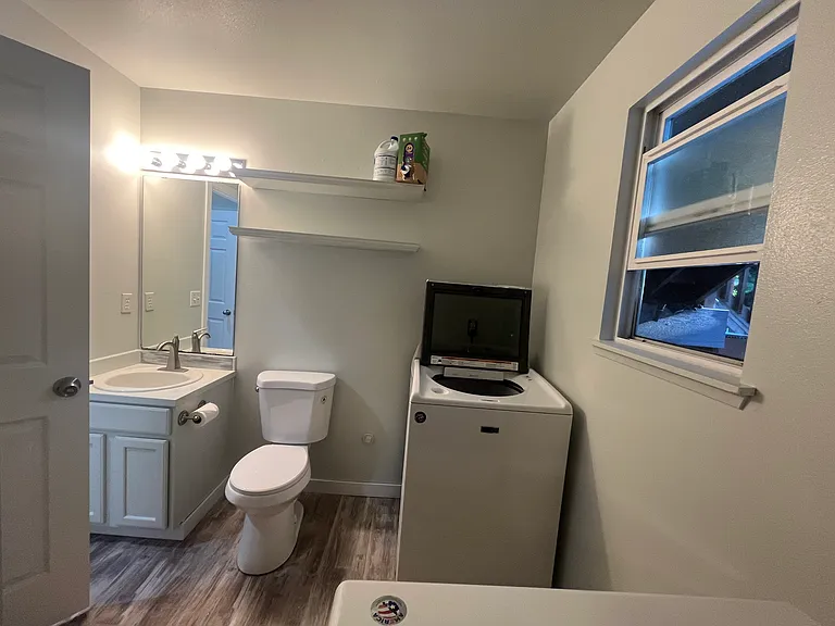 downstairs bathroom w/ laundry