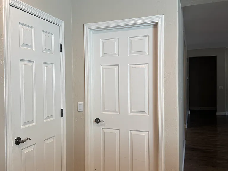 Door to Laundry room and built in Pantry