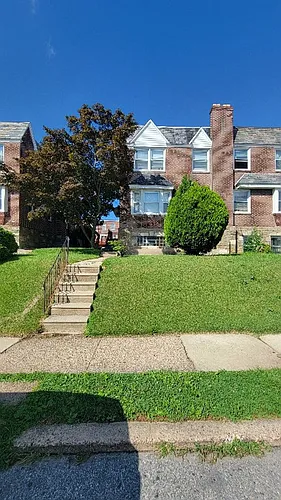 7703 Woolston Ave Photo 1