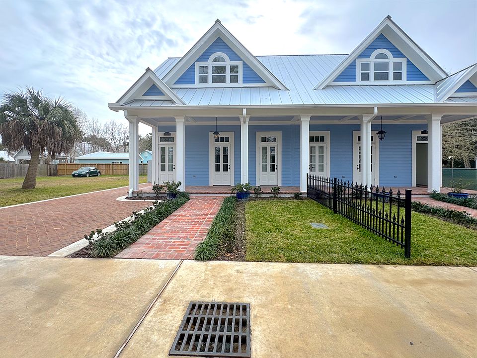 Ample parking space off the street and on the side of the house