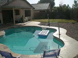 Pool with basketball hoop for entertaining