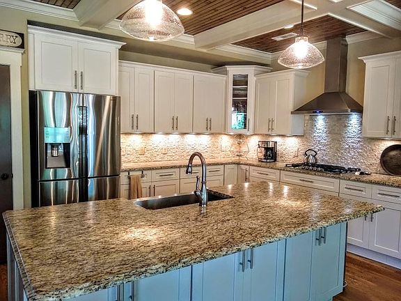 The kitchen is spacious with a huge island!