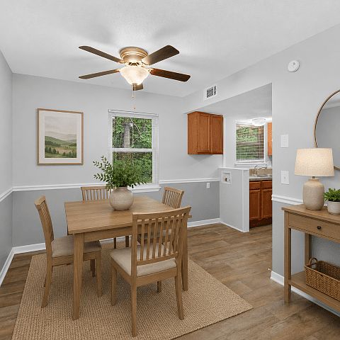 Separate dining space conveniently located adjacent to the kitchen.