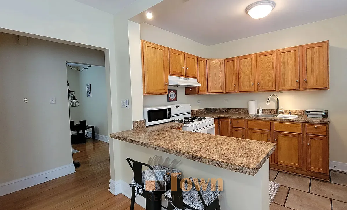Building Photo - 3642 N Lockwood Ave #2