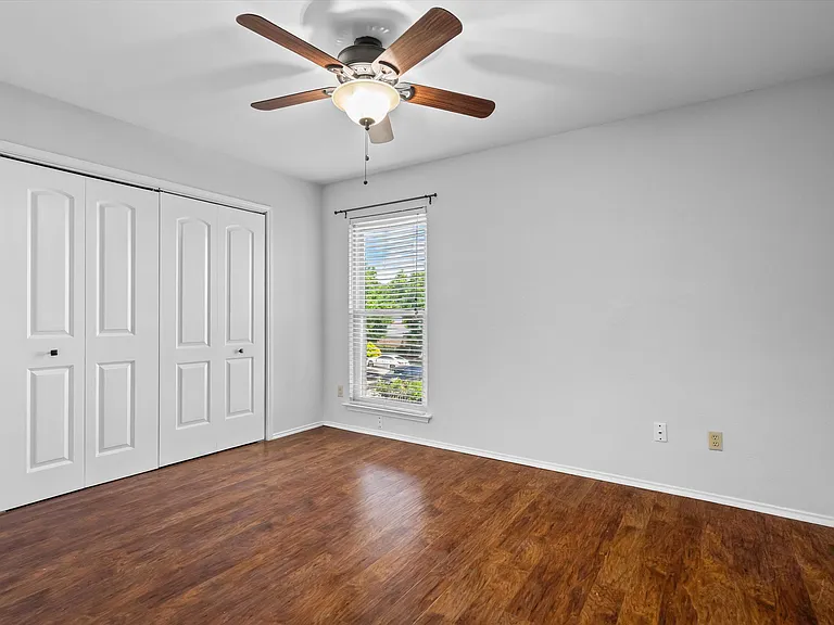 This secondary bedroom has 10 feet of closet space!