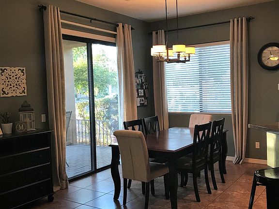 Dining area which leads to covered outdoor patio
