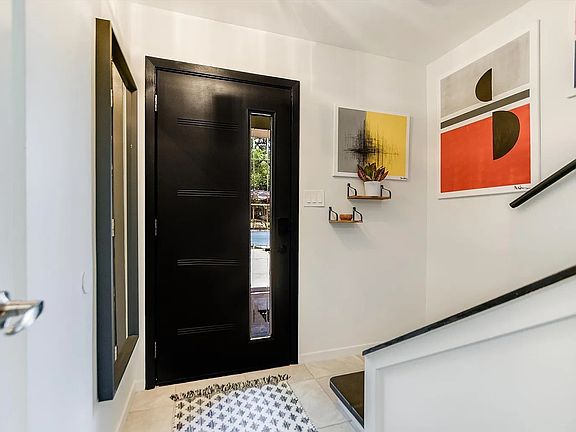 Front door hallway with radiant floor heating