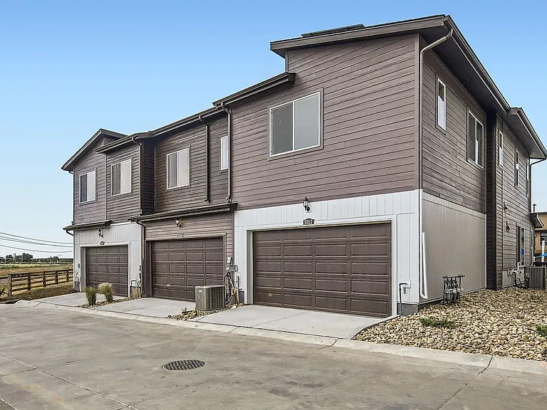 Attached 2-car garage in rear of unit