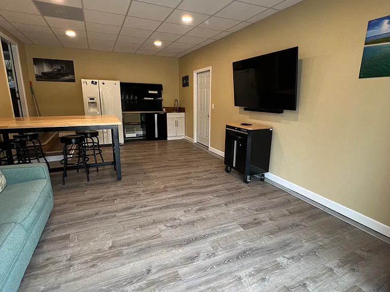 man cave with smart TV and sound system