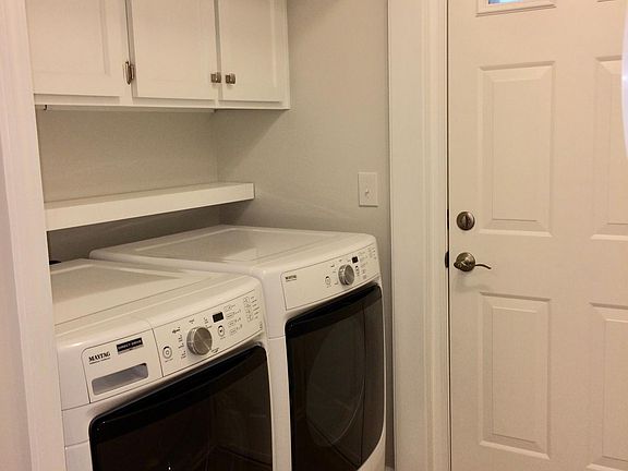 Front load washer and dryer in home