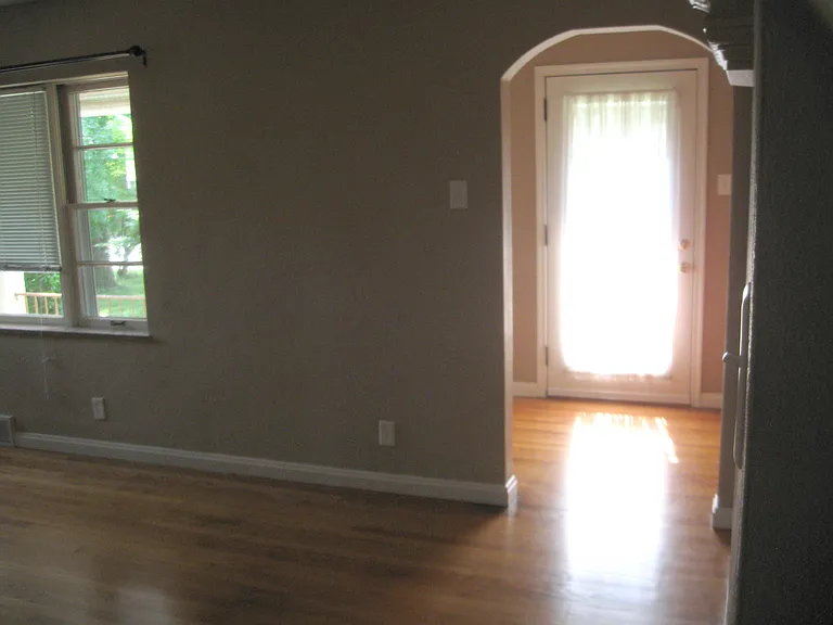 Must be late afternoon as I shot photo from Living room to foyer, going West.