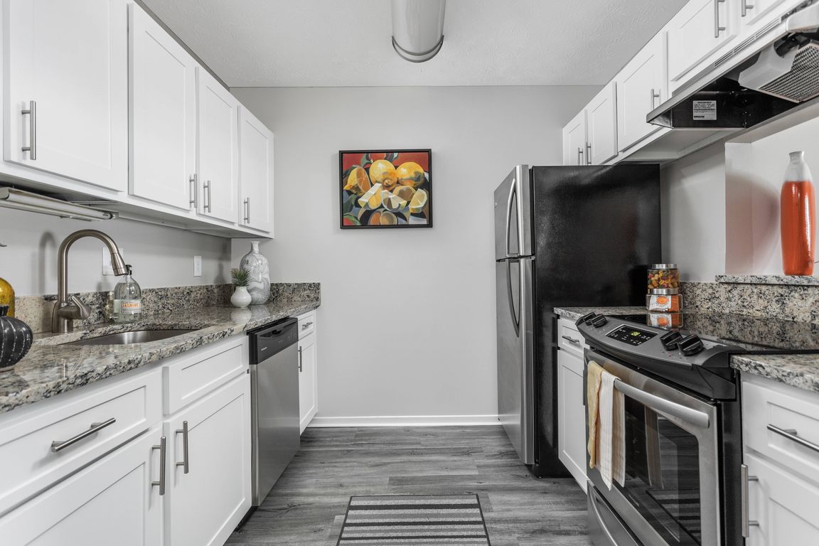 Kitchen with Stainless Steel Appliances and Granite Countertops