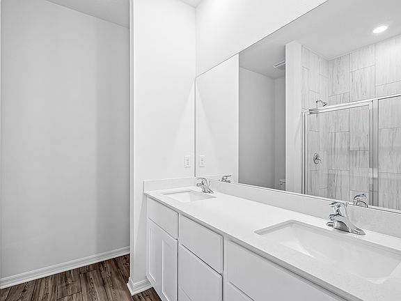 Enjoy a dual sink vanity in the master bathroom