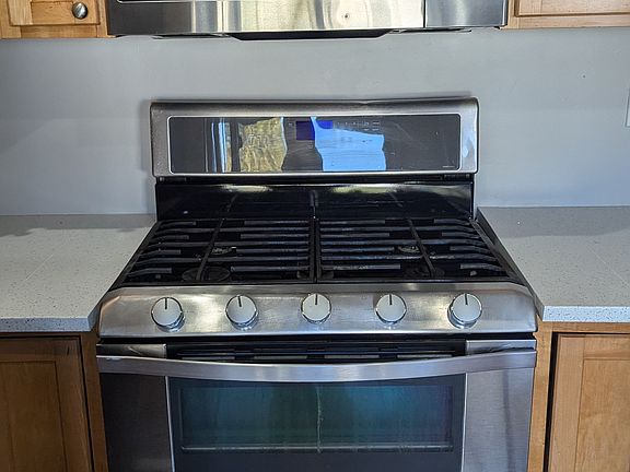 Whirlpool stove and oven; GE microwave