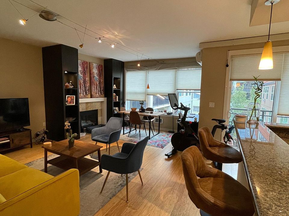 Living and dining room, with bamboo hardwood floors.