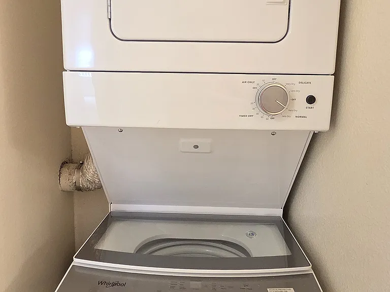 Upgraded Washer and Dryer Stacked Set in Unit