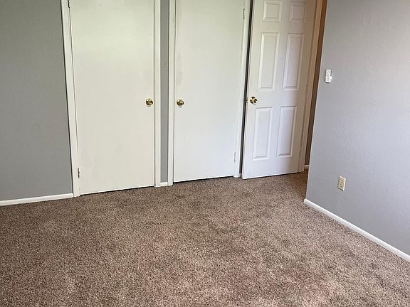 Upstairs main bedroom with two closets.